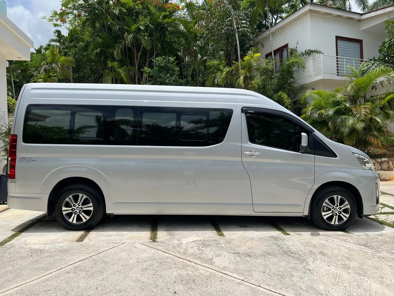 Silver Jamare Tours passenger vehicle photographed in Jamaica
